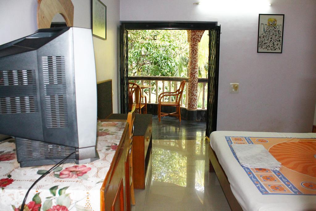 White Pearl Guest House Morjim Chambre photo