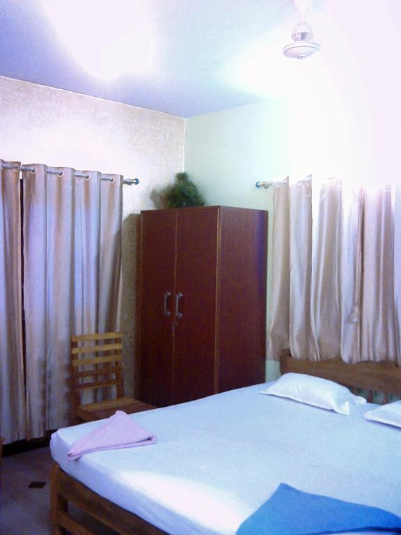 White Pearl Guest House Morjim Chambre photo